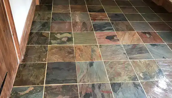 Restored slate floor showcasing clearer colour, balanced tone, and improved surface definition